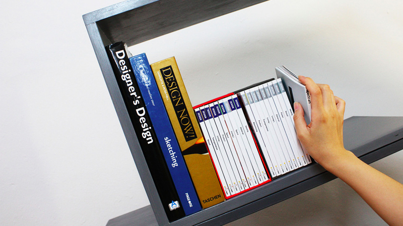 Illustration for article titled This Stackable Angled Shelf Just Made Bookends Obsolete